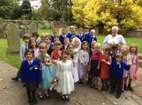 Whitchurch children role play a wedding