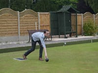 Ellis tries... Bowling