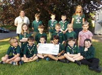 Walford cubs raise funds for Cancer Research UK