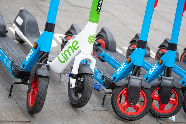 General view of E-Scooters operated by Dott, Lime and Tier at an E-Scooter hire point in Kensington, west London Picture date: Tuesday June 29, 2021.