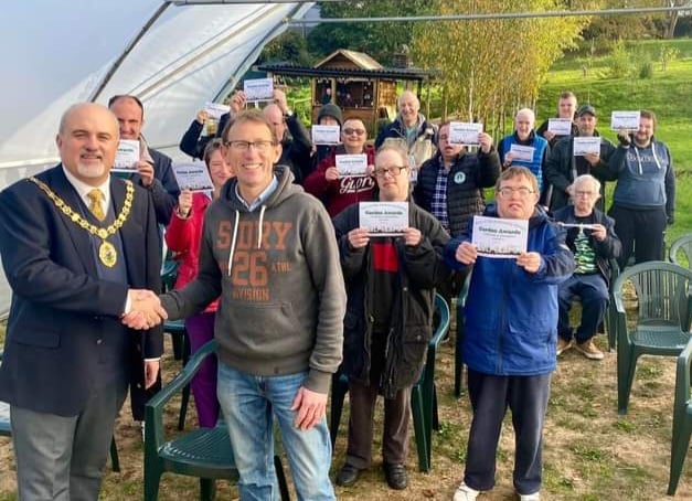 Ross Mayor Ed O’Driscoll with members of the Ross Community Garden