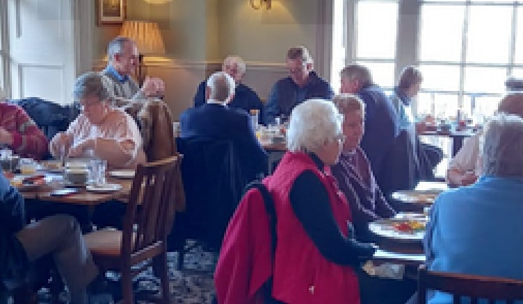 Royal British Legion members enjoying a hearty breakfast