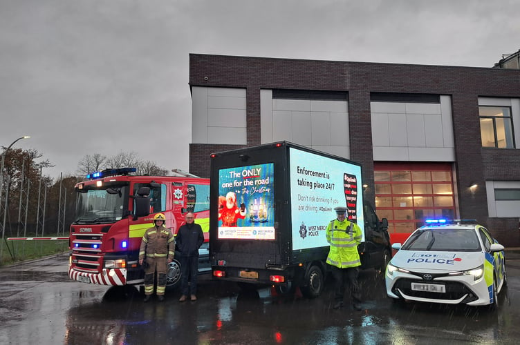 Members of the Wenlock Spring team with representatives from West Mercia Police and the fire service