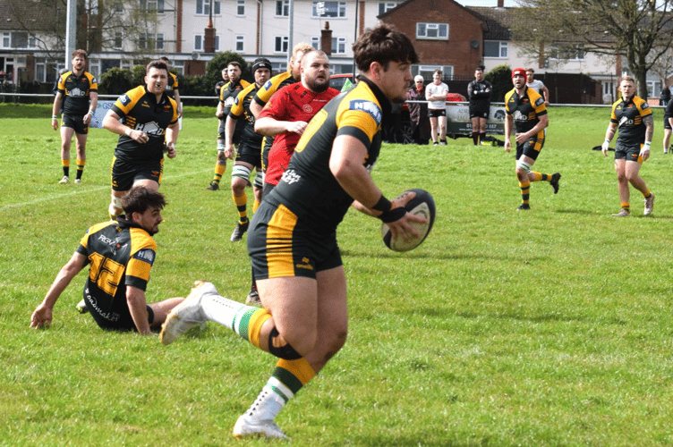 A Newent player makes a break