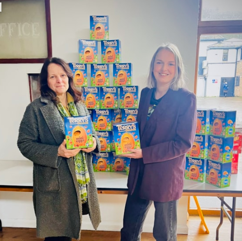 PGL’s Manager Kathryn Beaumont donating Easter eggs to The Hope Support Service charity 