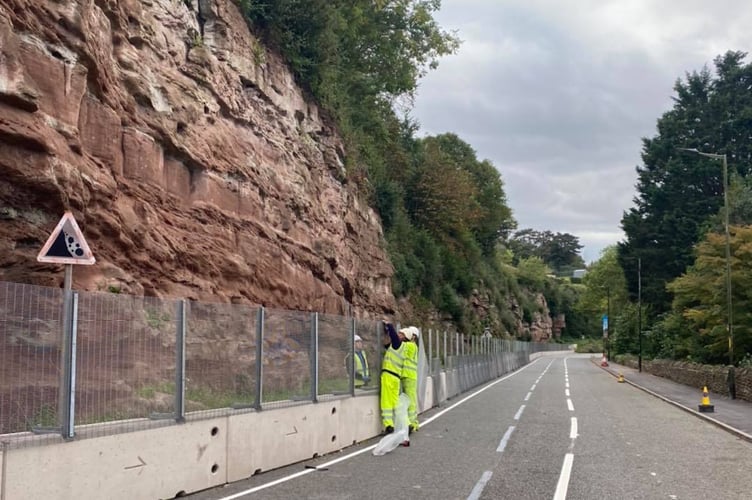 Highways officers inspect the safety measures after they were installed in 2021.