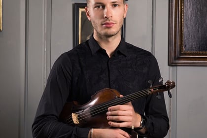 International violinist at music concert