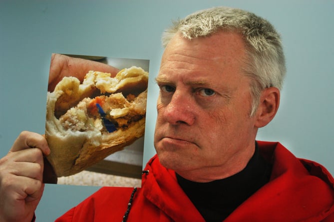 Man holding photograph