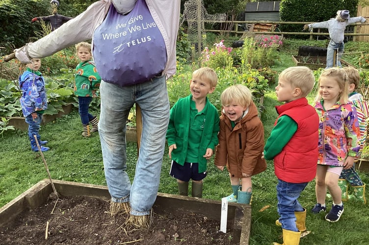 Children and scarecrows