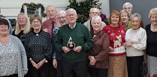 Matty is presented with Good Neighbour’s award 